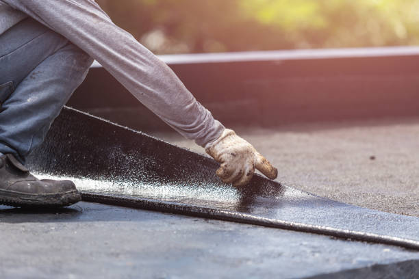 Professional Exterior Waterproofing technician working in Dover, KY